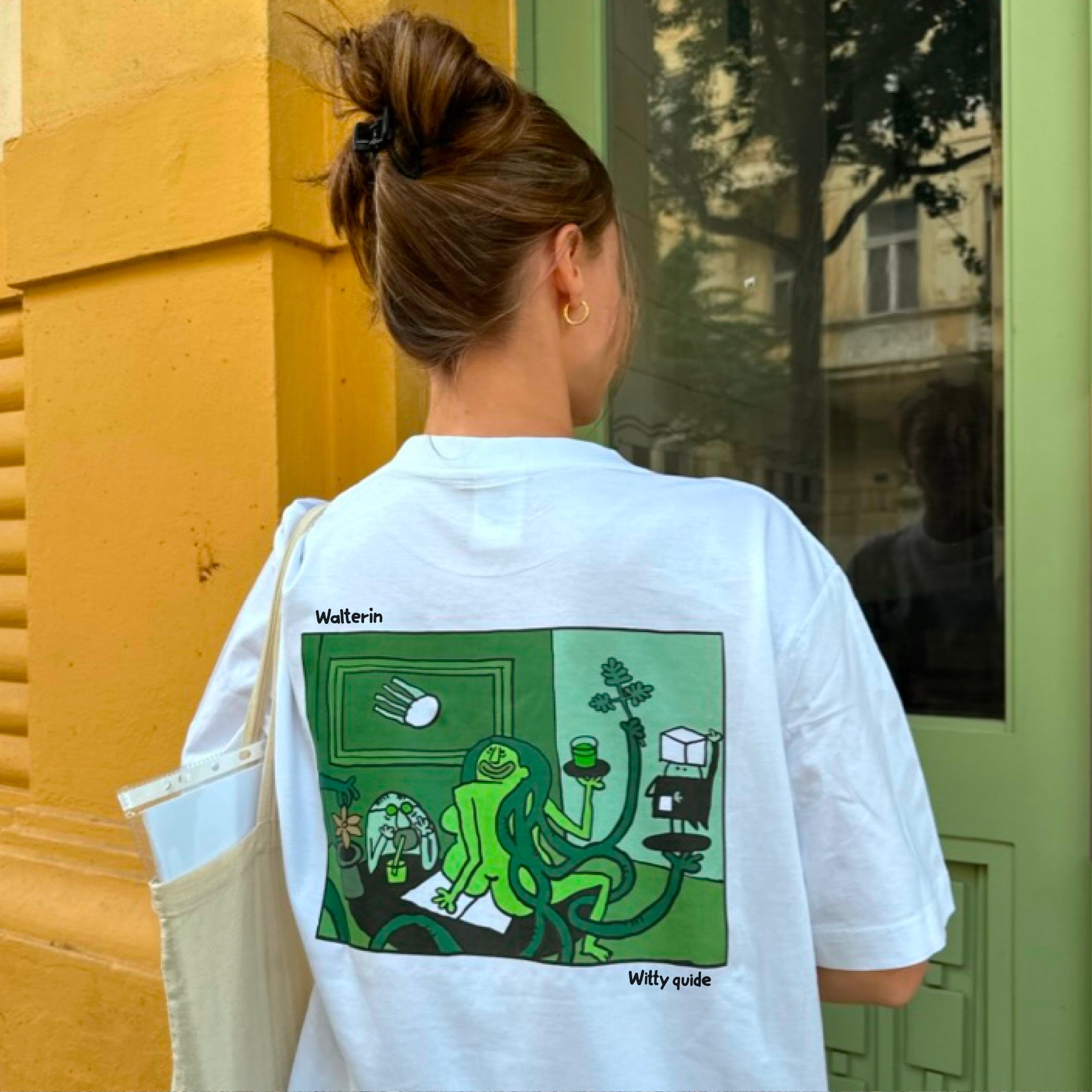 Walterin Prague T-shirt with full comic-style illustration of the absinth drinker and green fairy on the back