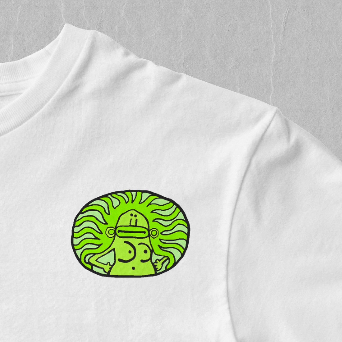 Close-up of Walterin Prague green fairy and absinth drinker illustrated emblem on the T-shirt